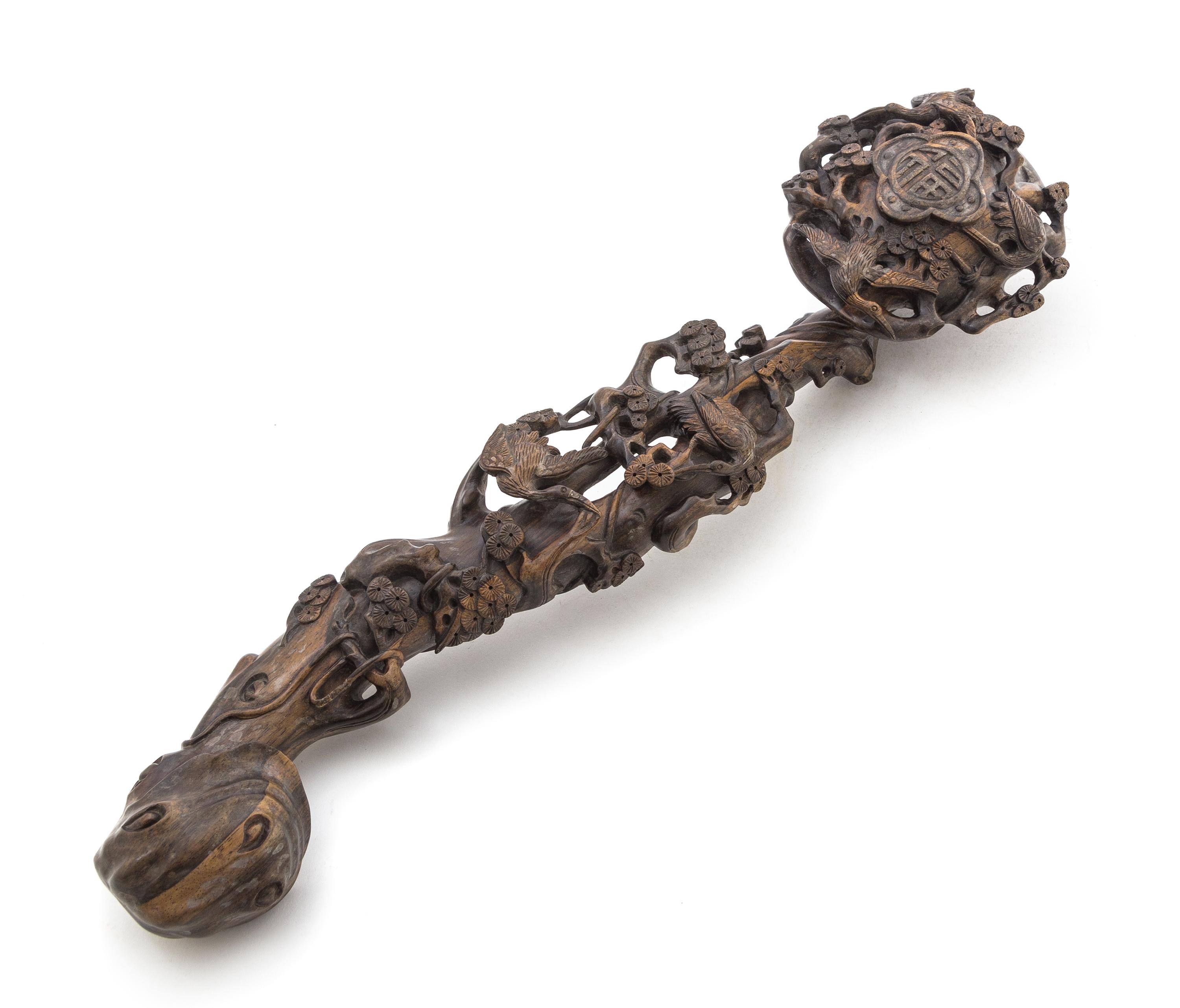 An Aloeswood Ruyi Scepter Length 19 1/4 inches.