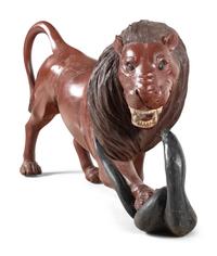 A Pair of Carved and Painted Wood Lions Wrestling Serpents