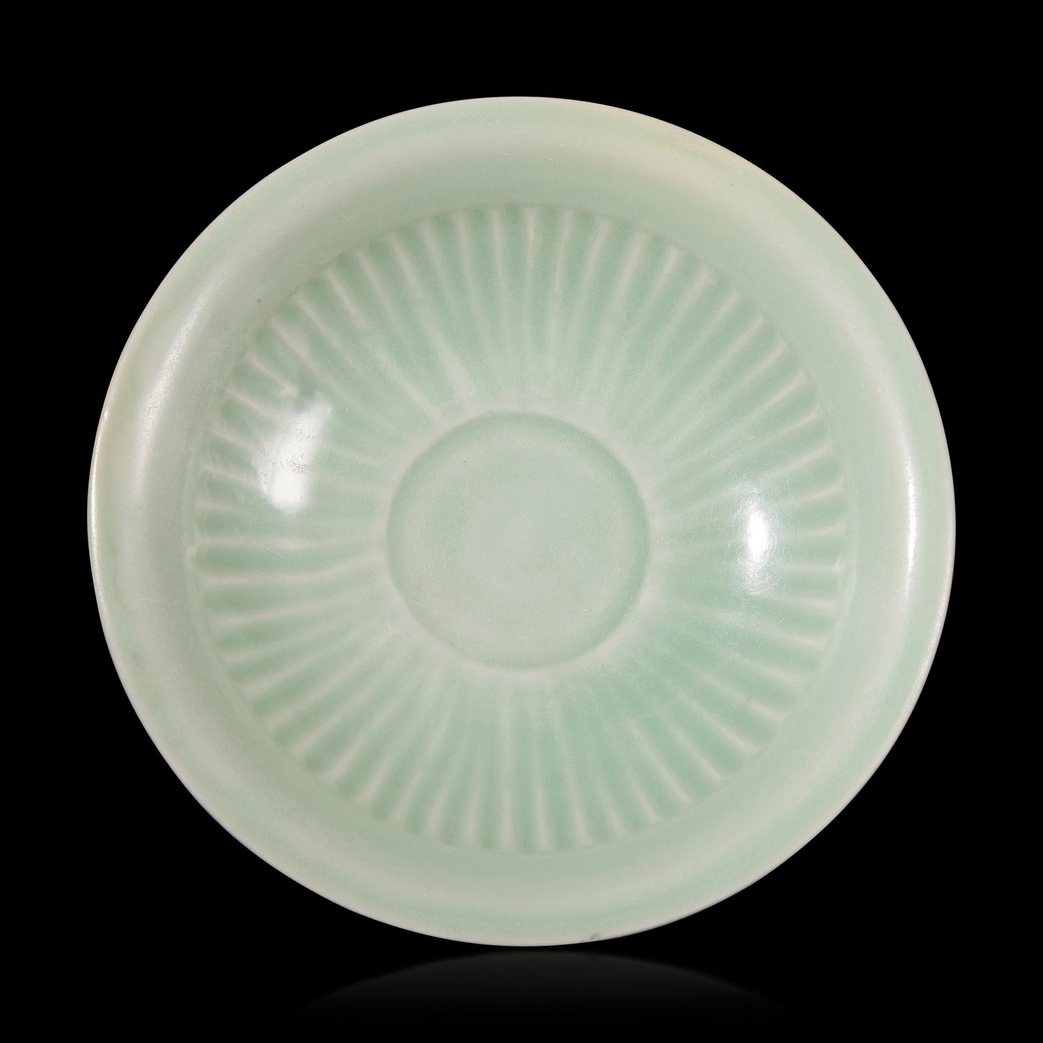 A Chinese Longquan Celadon Glazed Dish, 13th/14th Century 宋/元 龍泉窯梅子青釉碟
