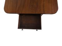 A Regency Mahogany Drop Leaf Table — 19TH CENTURY