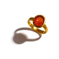 A Roman Carnelian Ring Stone with the Portrait Head of a Young Hercules — Set in a gold ring