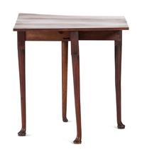 A George III Figured Mahogany Pad-Foot Drop-Leaf Table