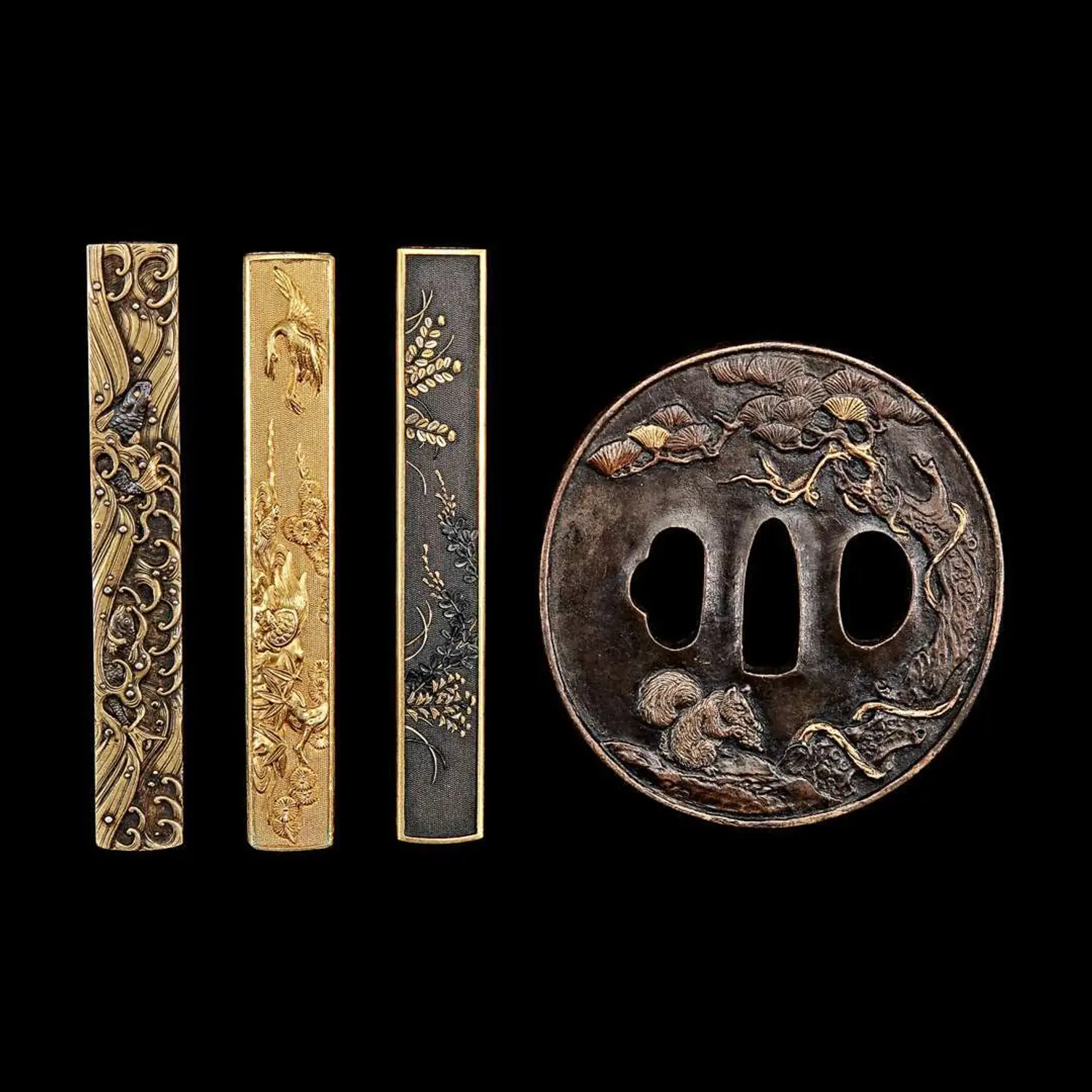 Three Japanese signed kozuka handles and a 