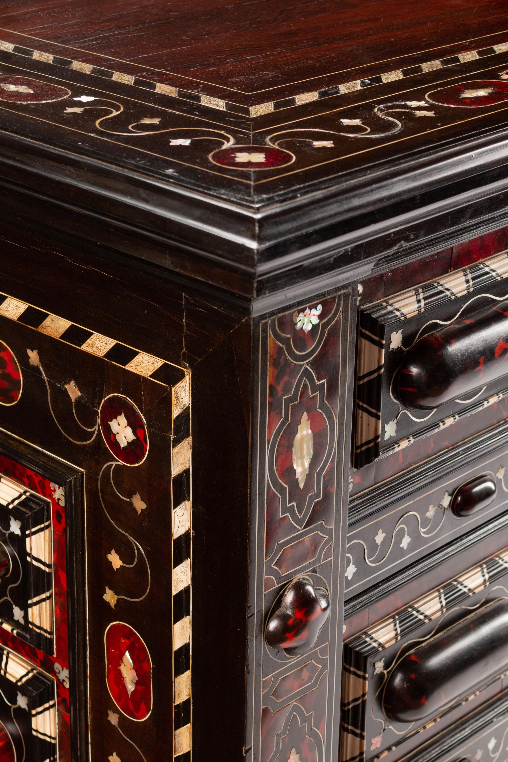A Portuguese Ebony and Mother-of-Pearl-Inlaid Chest of Drawers — 19TH CENTURY