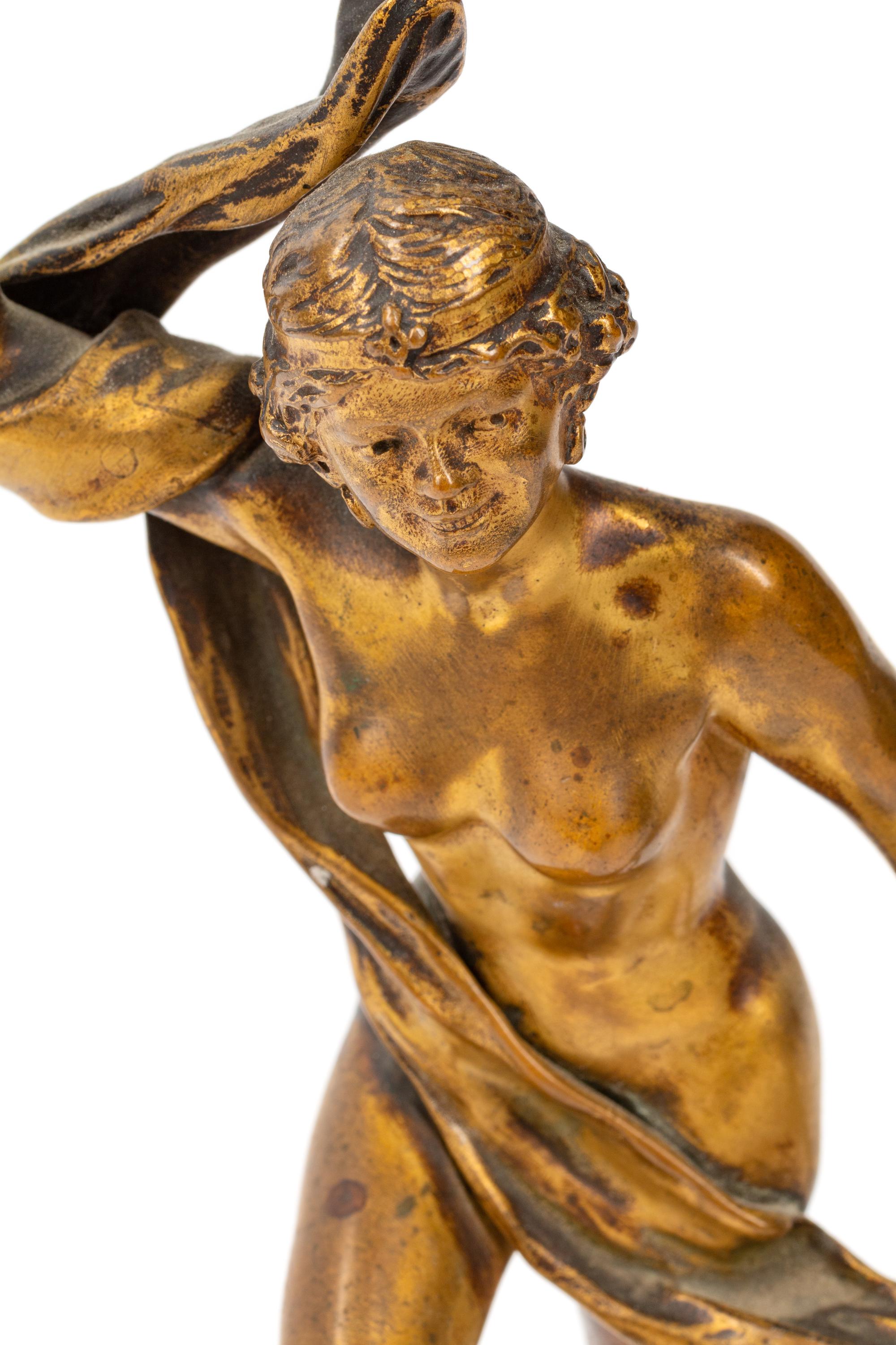 A French Gilt Bronze Figure on a Marble Base