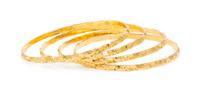 A Set of High Karat Gold Bangle Bracelets, 32.40 dwts.