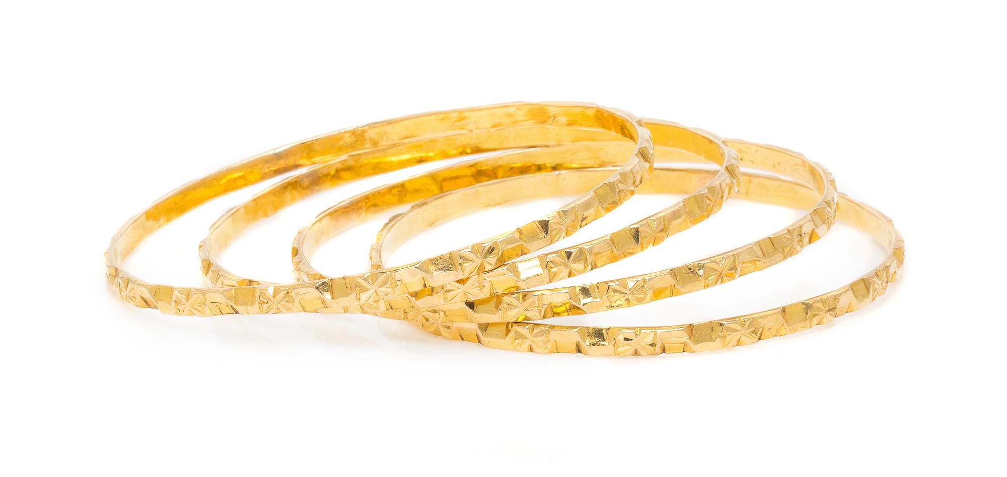 A Set of High Karat Gold Bangle Bracelets, 32.40 dwts.
