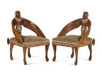A Pair of Egyptian Revival Mother-of-Pearl Inlaid Figural Armchairs