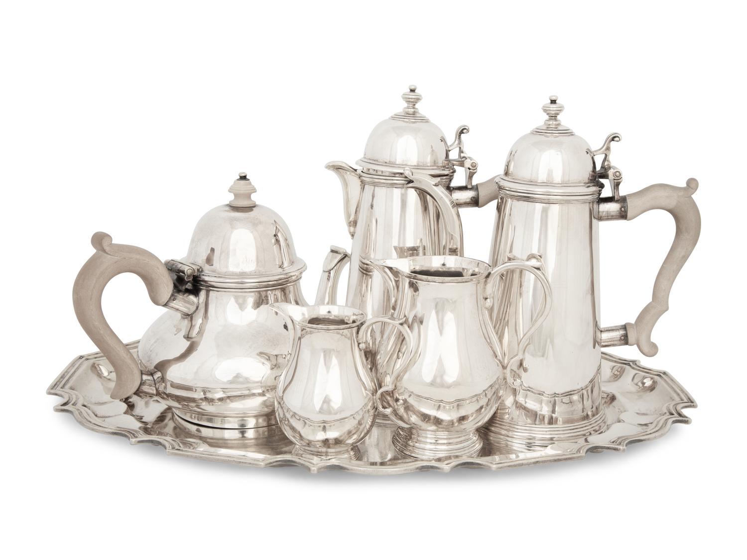 An English Queen Anne Style Silver Five-Piece Tea and Coffee Service