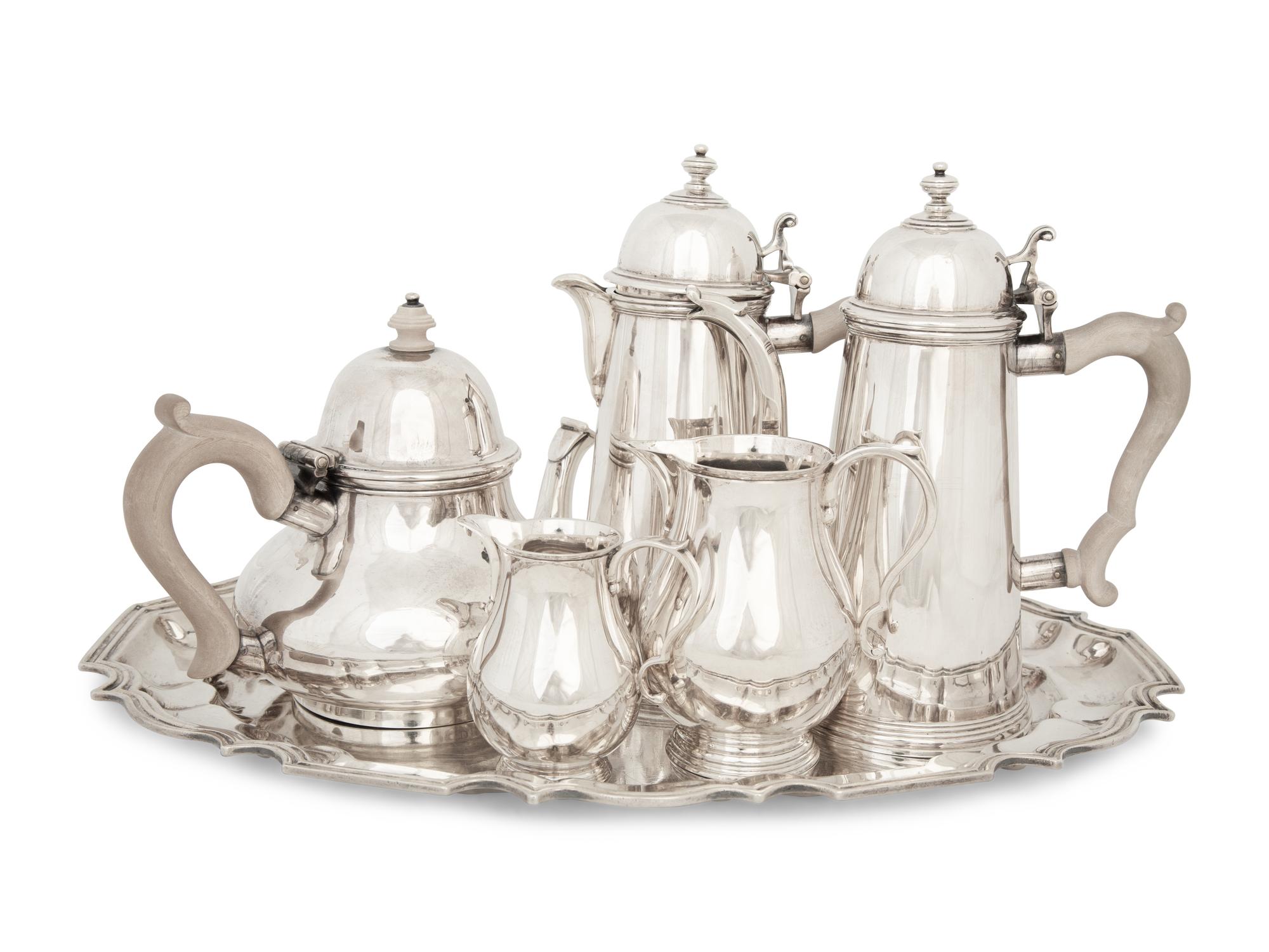 An English Queen Anne Style Silver Five-Piece Tea and Coffee Service