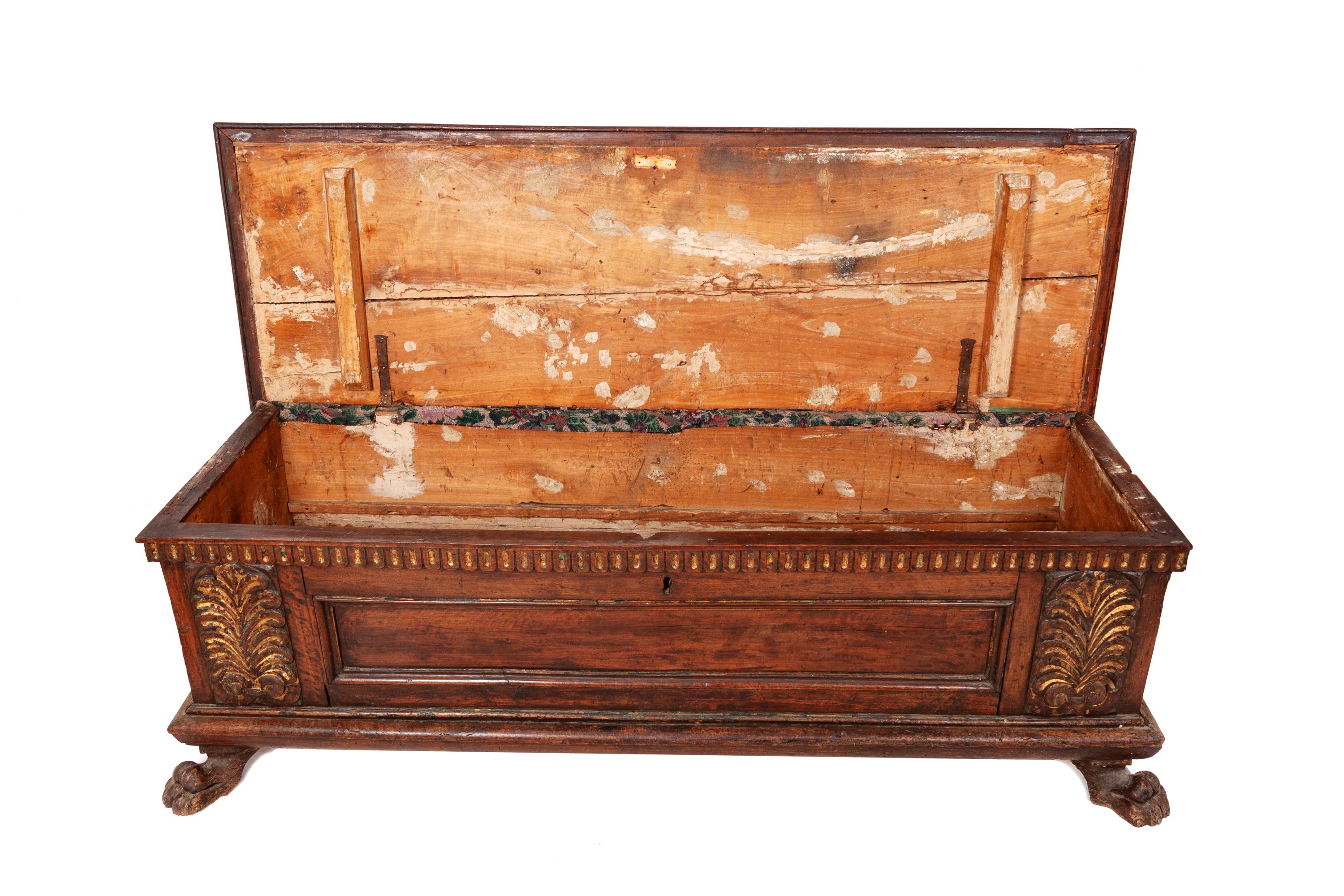 A Spanish Parcel Gilt Carved Walnut Chest