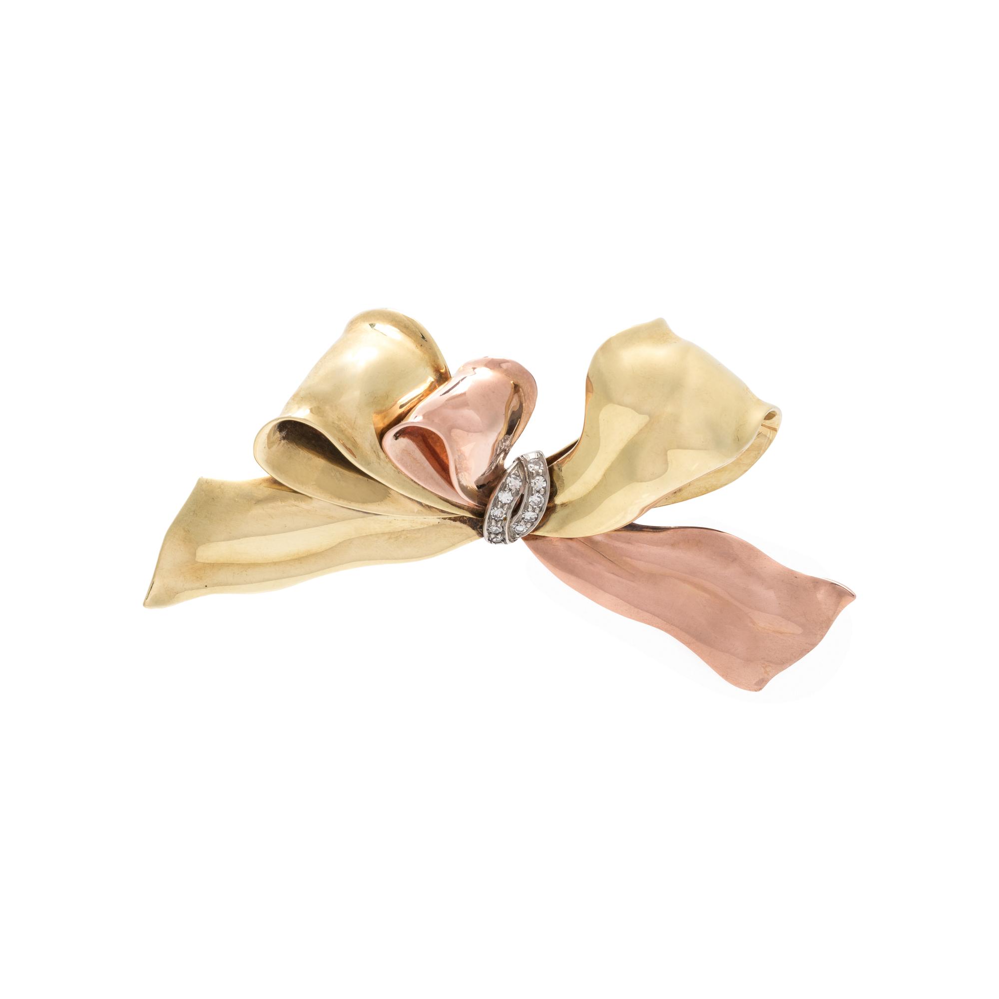 CARTIER, RETRO, BICOLOR GOLD AND DIAMOND BOW BROOCH