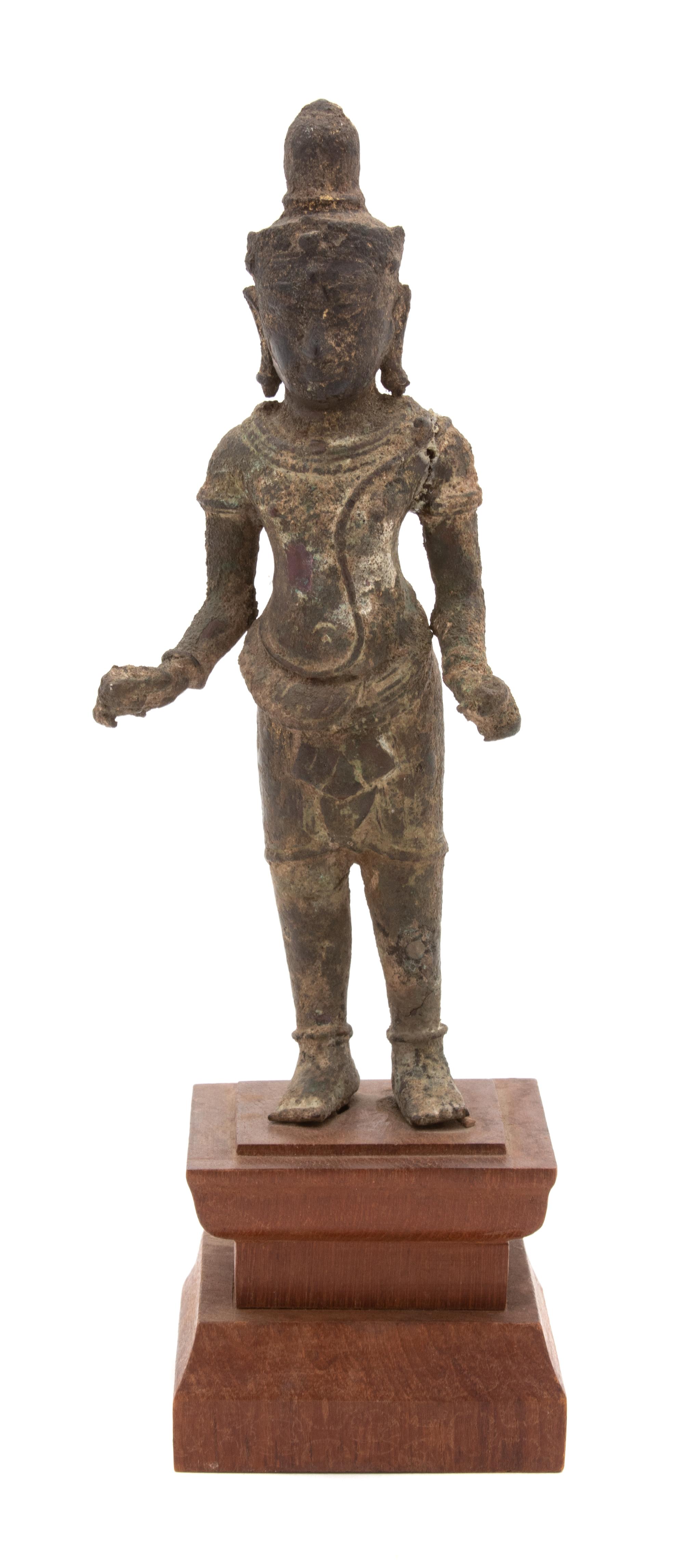 A Khmer Bronze Figure of a Standing Buddha Height 7 inches. — POSSIBLY 11TH/12TH CENTURY
