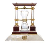 A French Carved Jasper, Rock Crystal, Diamond and Silver-Gilt Desk Clock — CHAUMET, PARIS