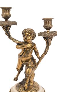 A Pair of French Gilt Bronze and Marble Figural Two-Light Candelabra