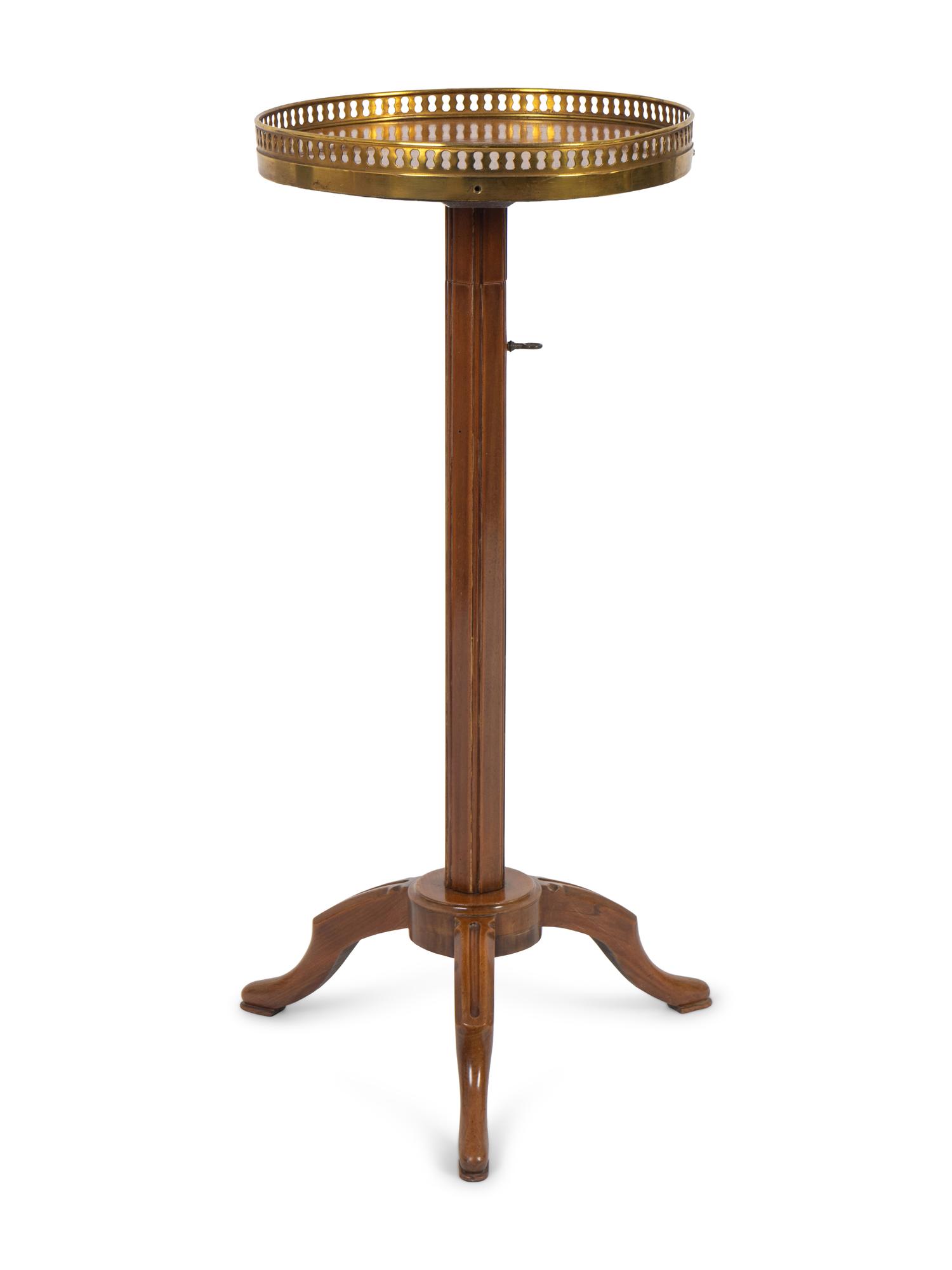 A Louis XVI Style Brass-Mounted Acajou Guéridon à Crémaillère