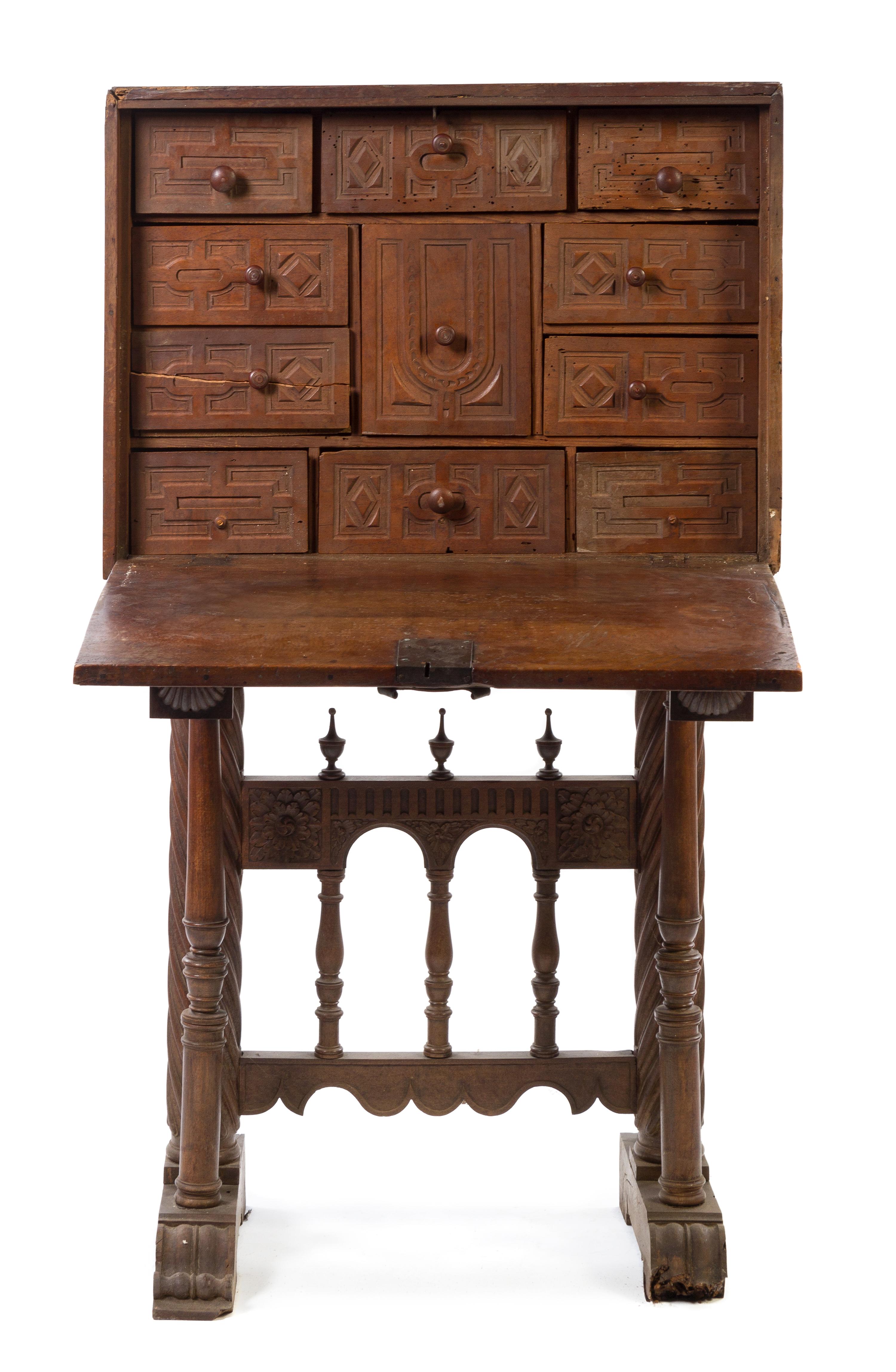 A Spanish Walnut Vargueno Height 46 1/2 x width 32 x depth 25 3/4 inches. — 19TH CENTURY
