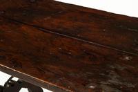 A Spanish Baroque Iron Mounted Walnut Trestle Table