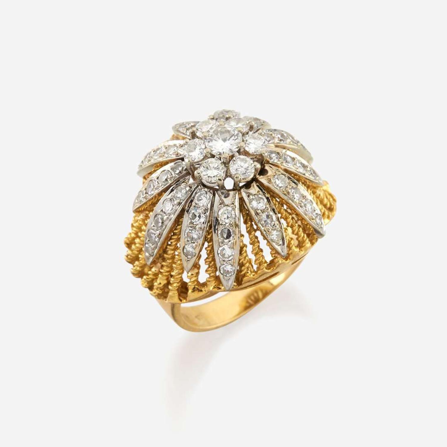 A bicolor gold and diamond ring