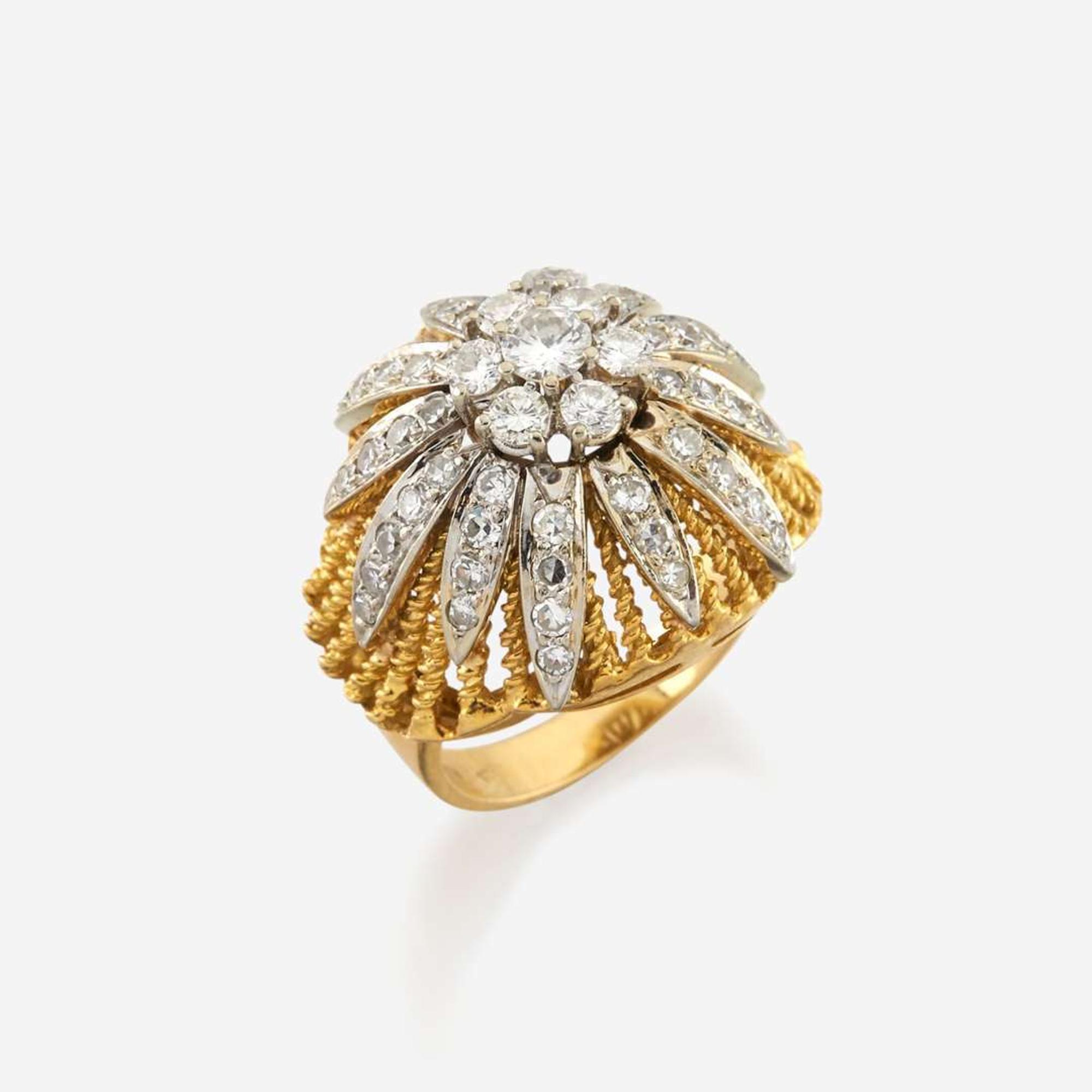 A bicolor gold and diamond ring