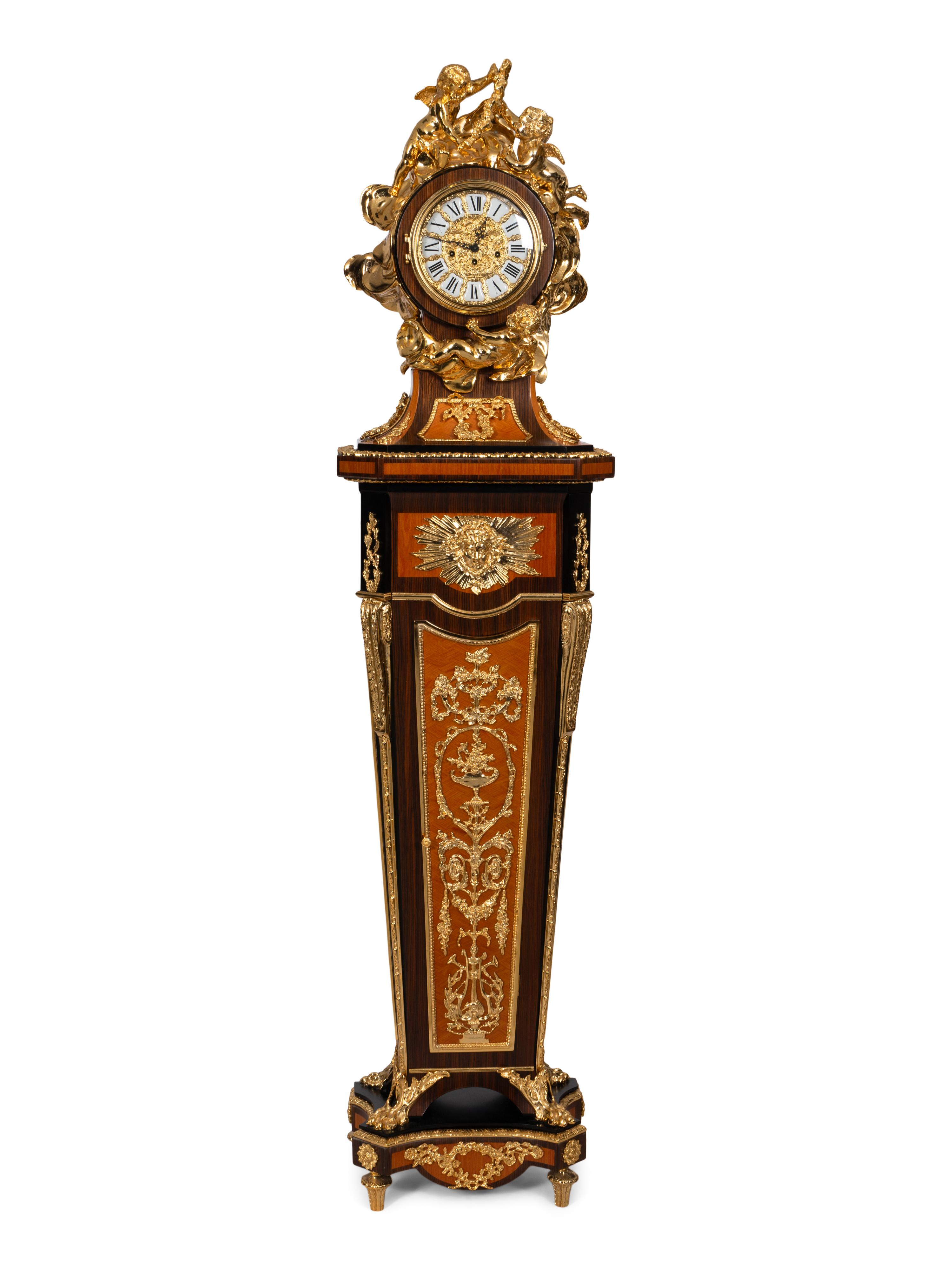 A Louis XVI Style Gilt Bronze Mounted Rosewood and Palisander Parquetry Longcase Clock