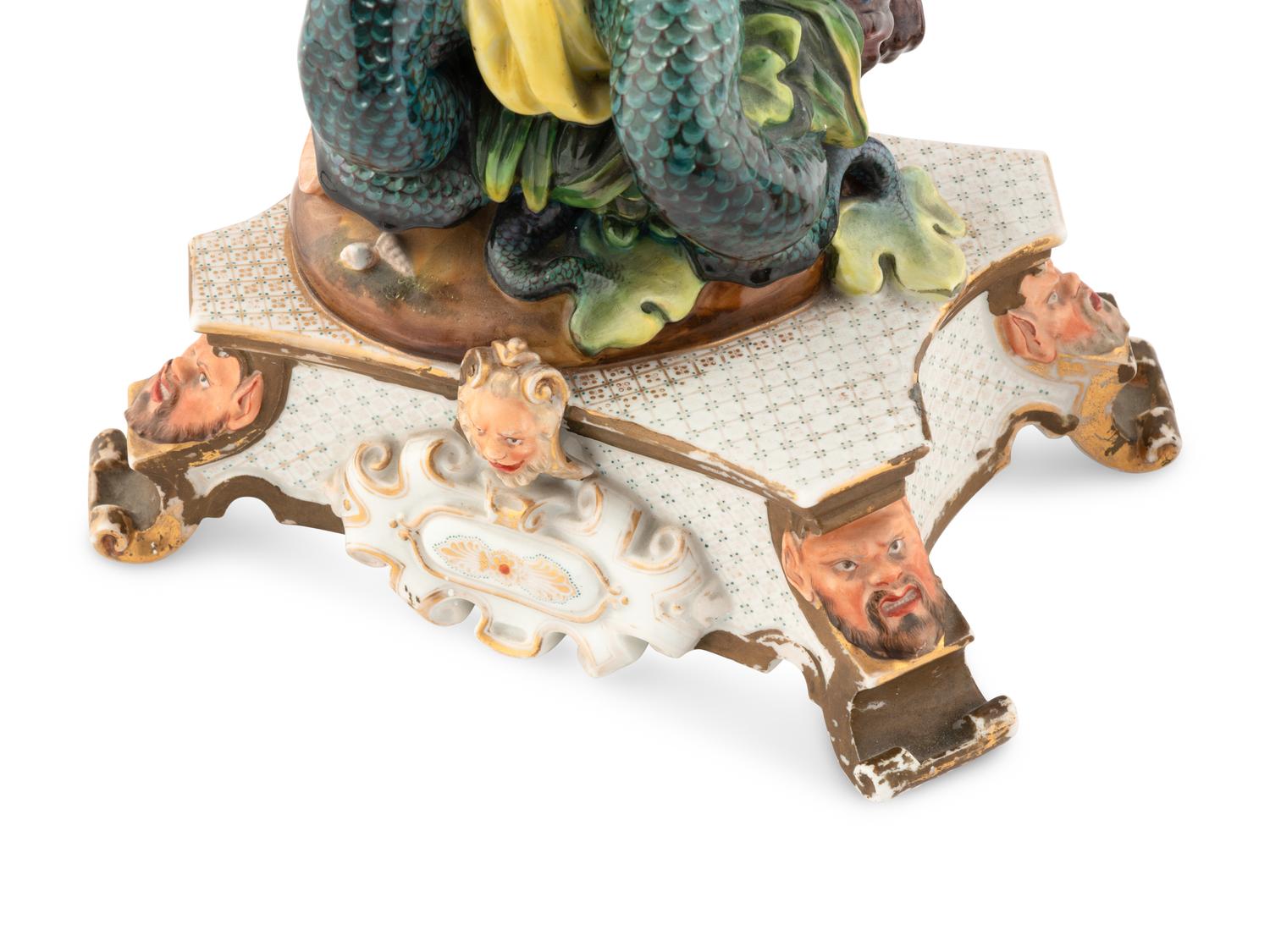 A Pair of Continental Porcelain Figural Vases