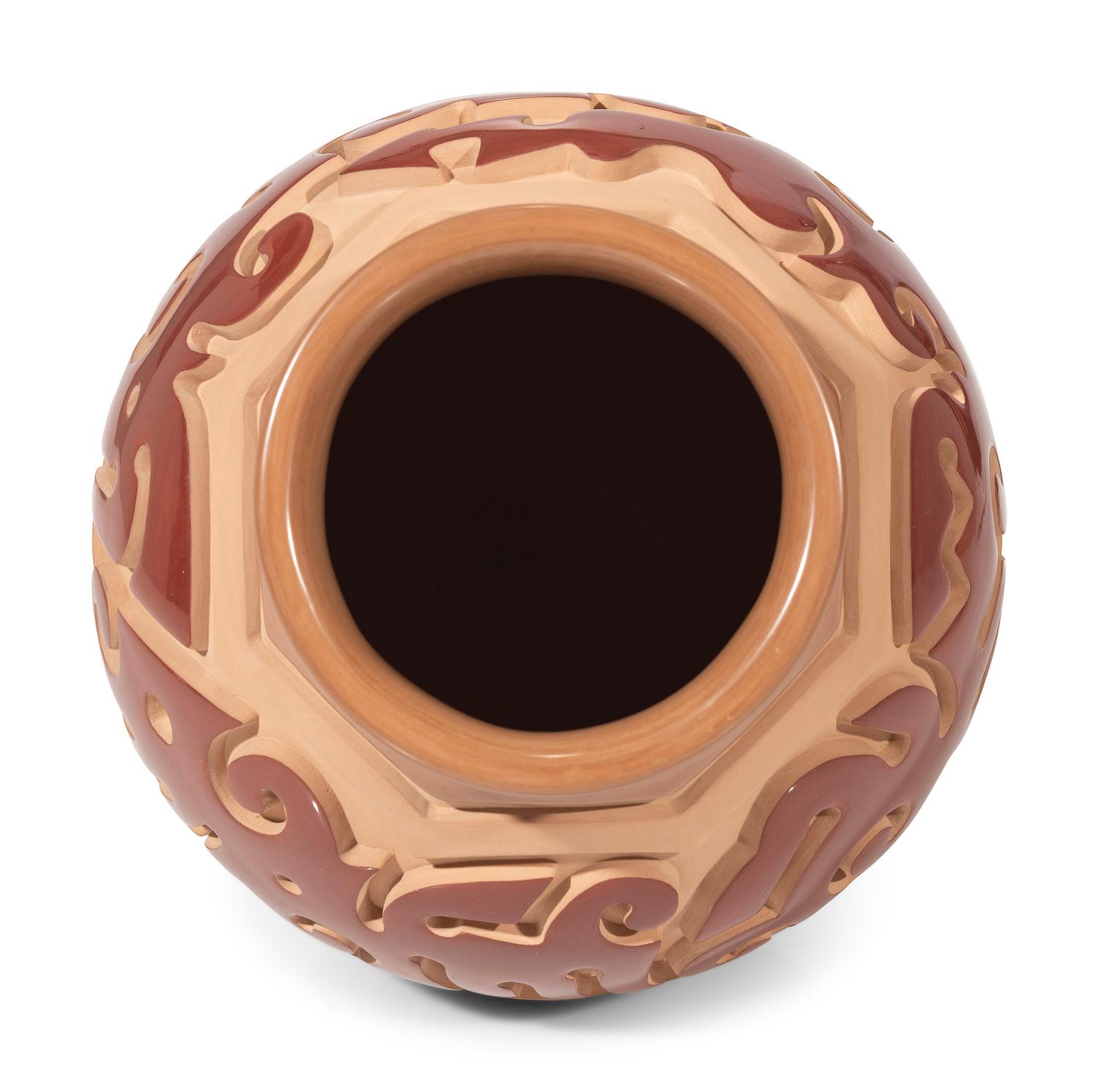 Red and Tan Carved Pottery Jar