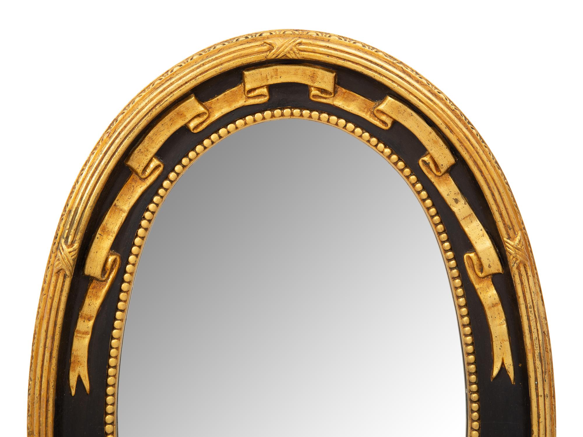 A Continental Parcel Gilt Mirror