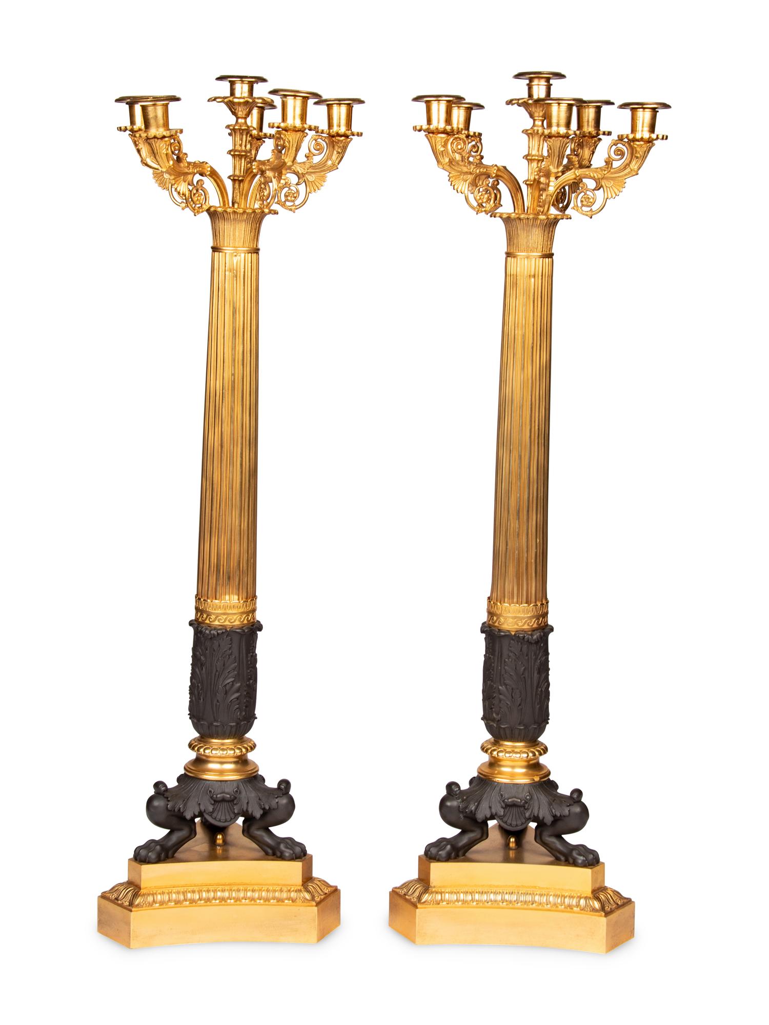 A Pair of Large Empire Style Gilt and Patinated Metal Six-Light Candelabra