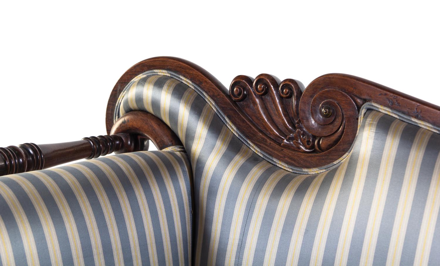A George IV Brass Mounted Carved and Figured Mahogany Sofa