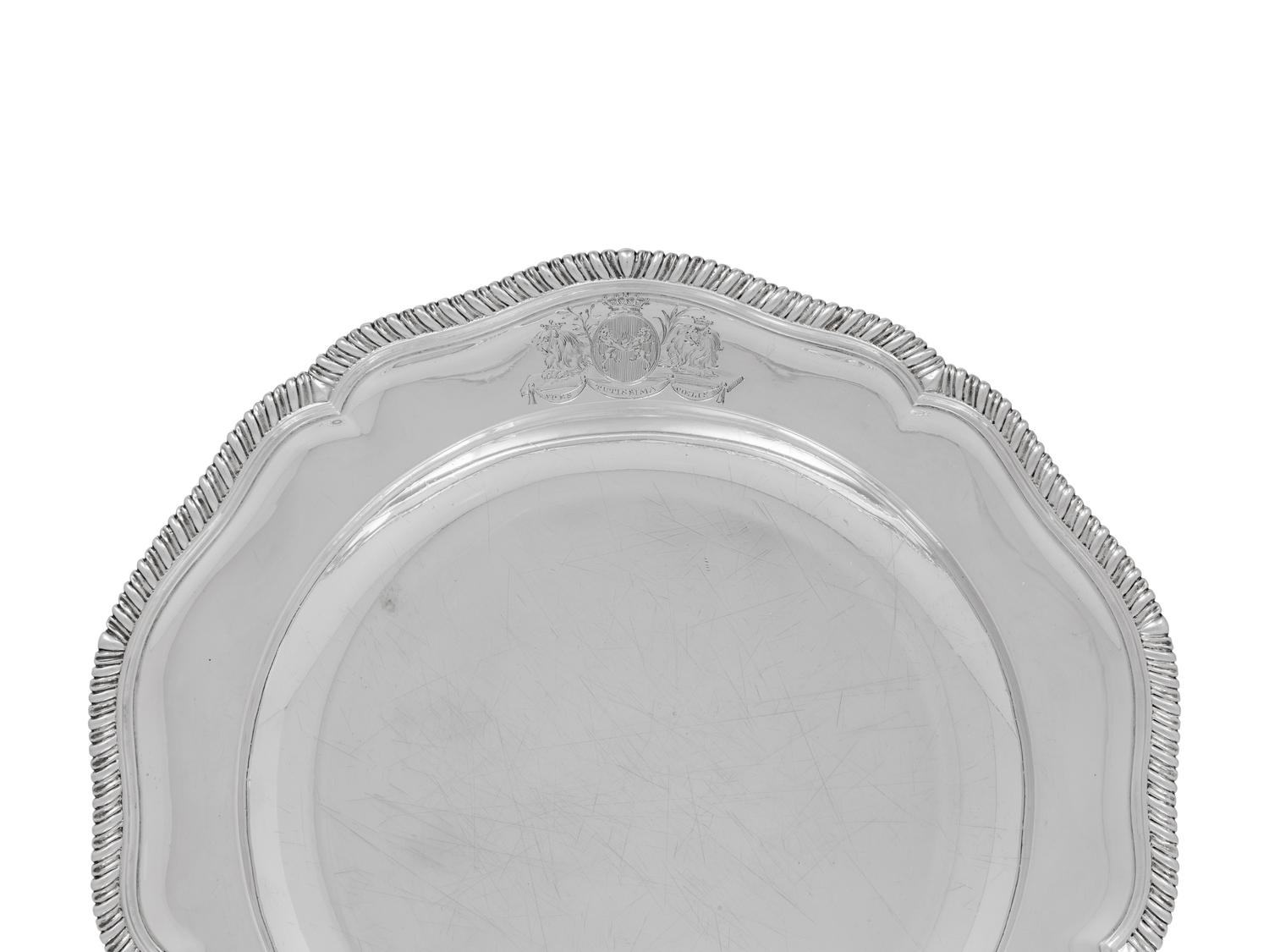 A Set of Ten George III Silver Dinner Plates