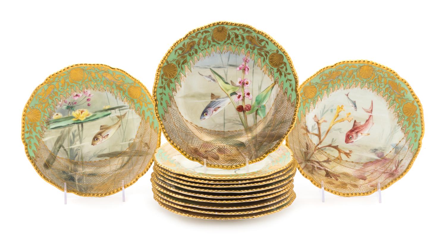 A Set of Twelve Coalport Porcelain Fish Service Plates Diameter 8 3/4 inches.