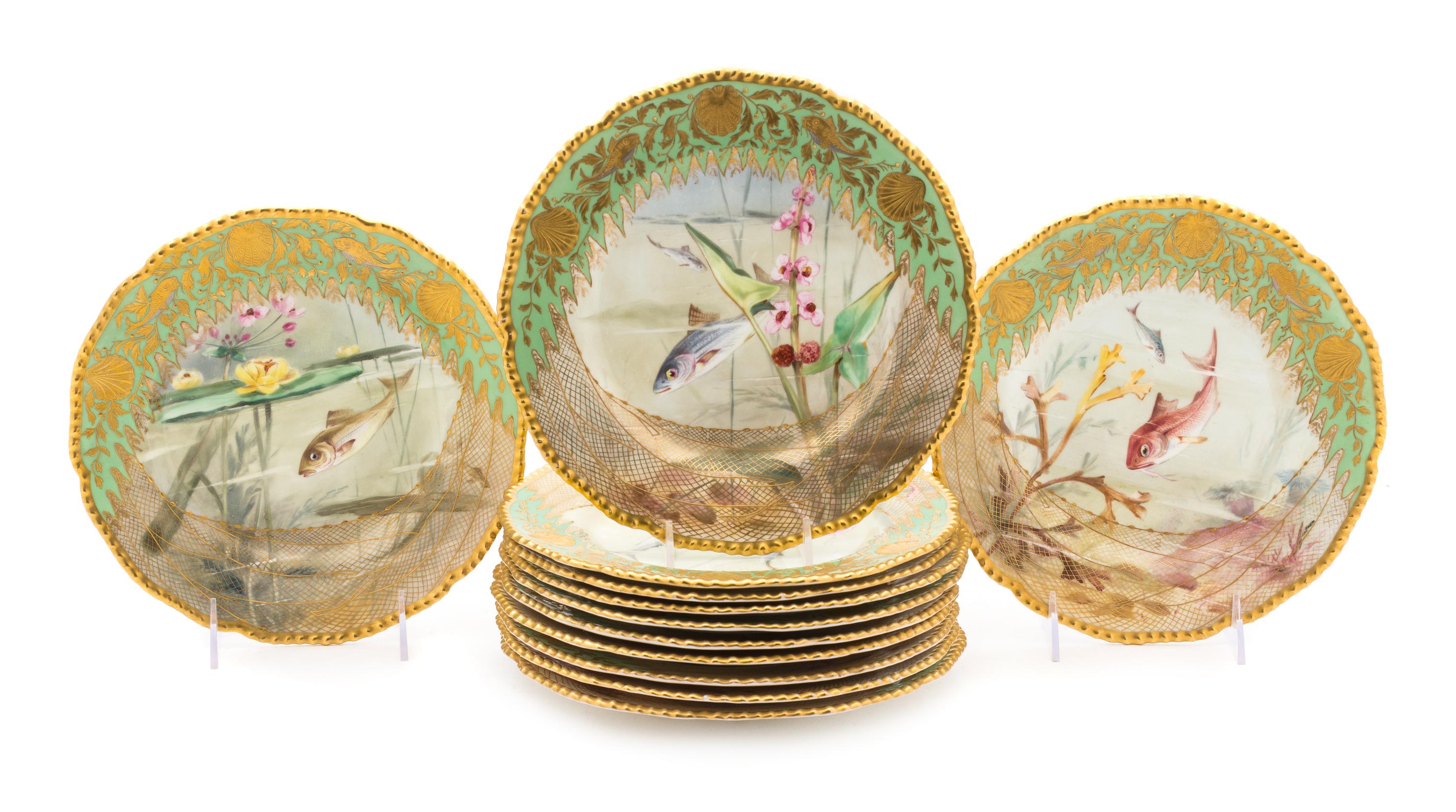 A Set of Twelve Coalport Porcelain Fish Service Plates Diameter 8 3/4 inches.