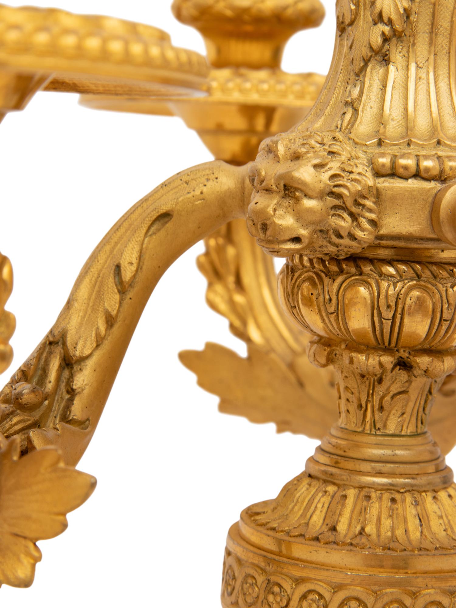 A Pair of Louis XVI Style Gilt Bronze Three-Light Candelabra