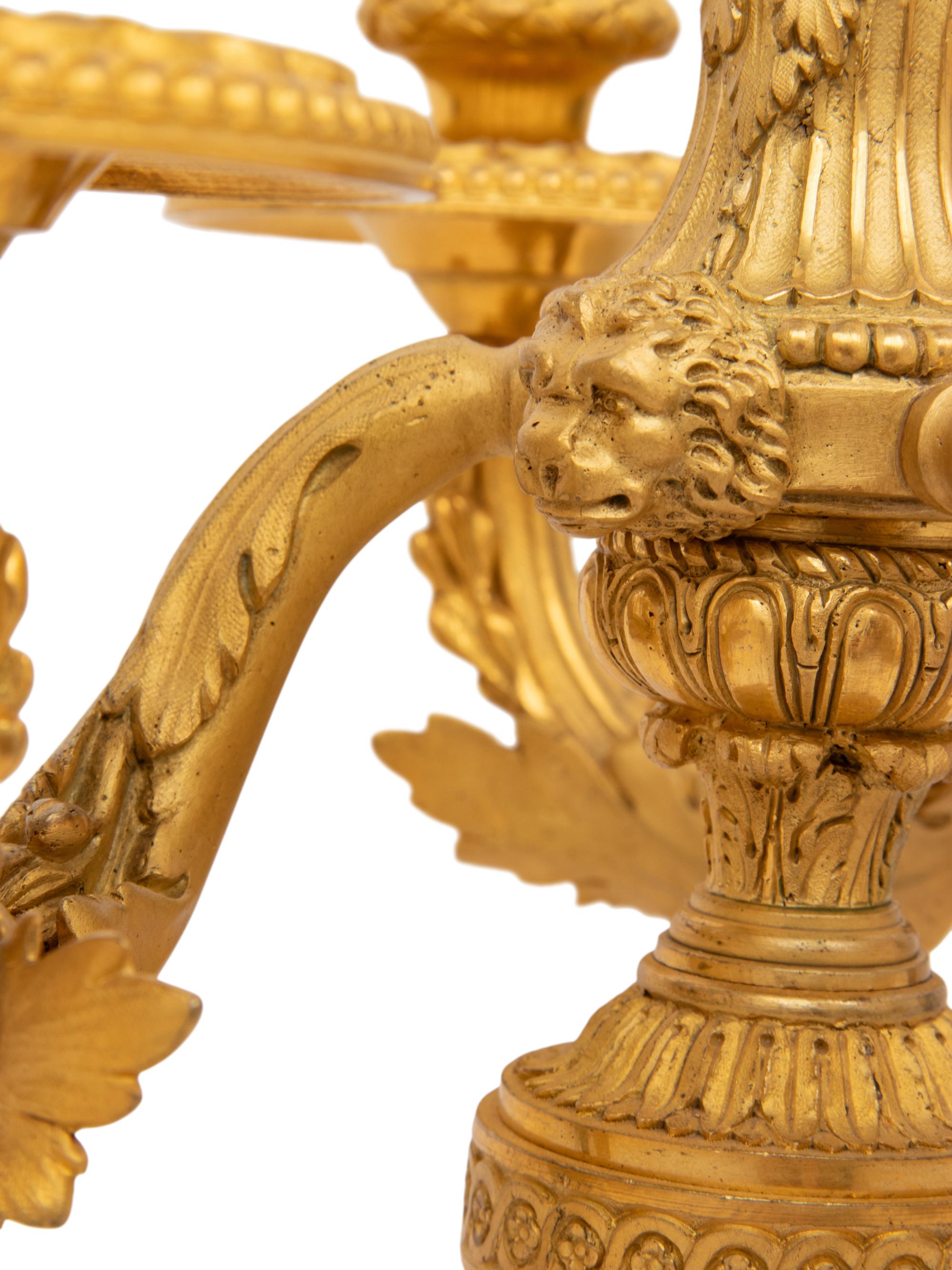 A Pair of Louis XVI Style Gilt Bronze Three-Light Candelabra