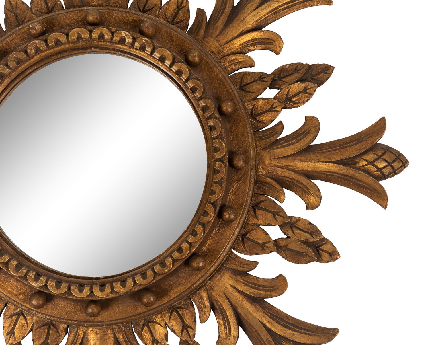 A Regency Style Carved Giltwood Sunburst Mirror