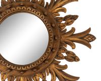 A Regency Style Carved Giltwood Sunburst Mirror