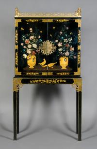 A Chinese Lacquered and Parcel Gilt Chest on Stand, Height 71 x width 35 1/2 x depth 18 1/2 inches.