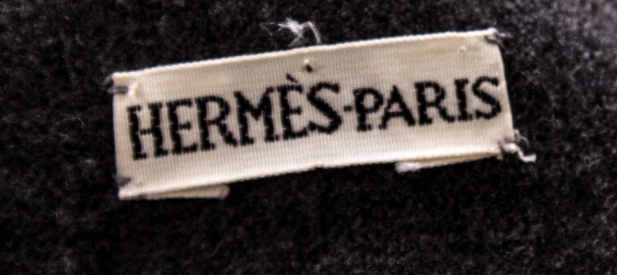 An Hermès Grey Wool Sheath Skirt, Size 46.