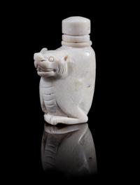 Two Carved Snuff Bottles Height of first 3 inches.
