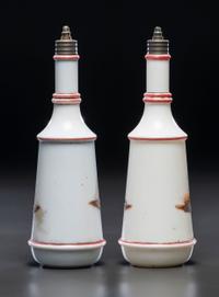 A Pair of Hand Painted Personalized Milk Glass Barber's Bottles