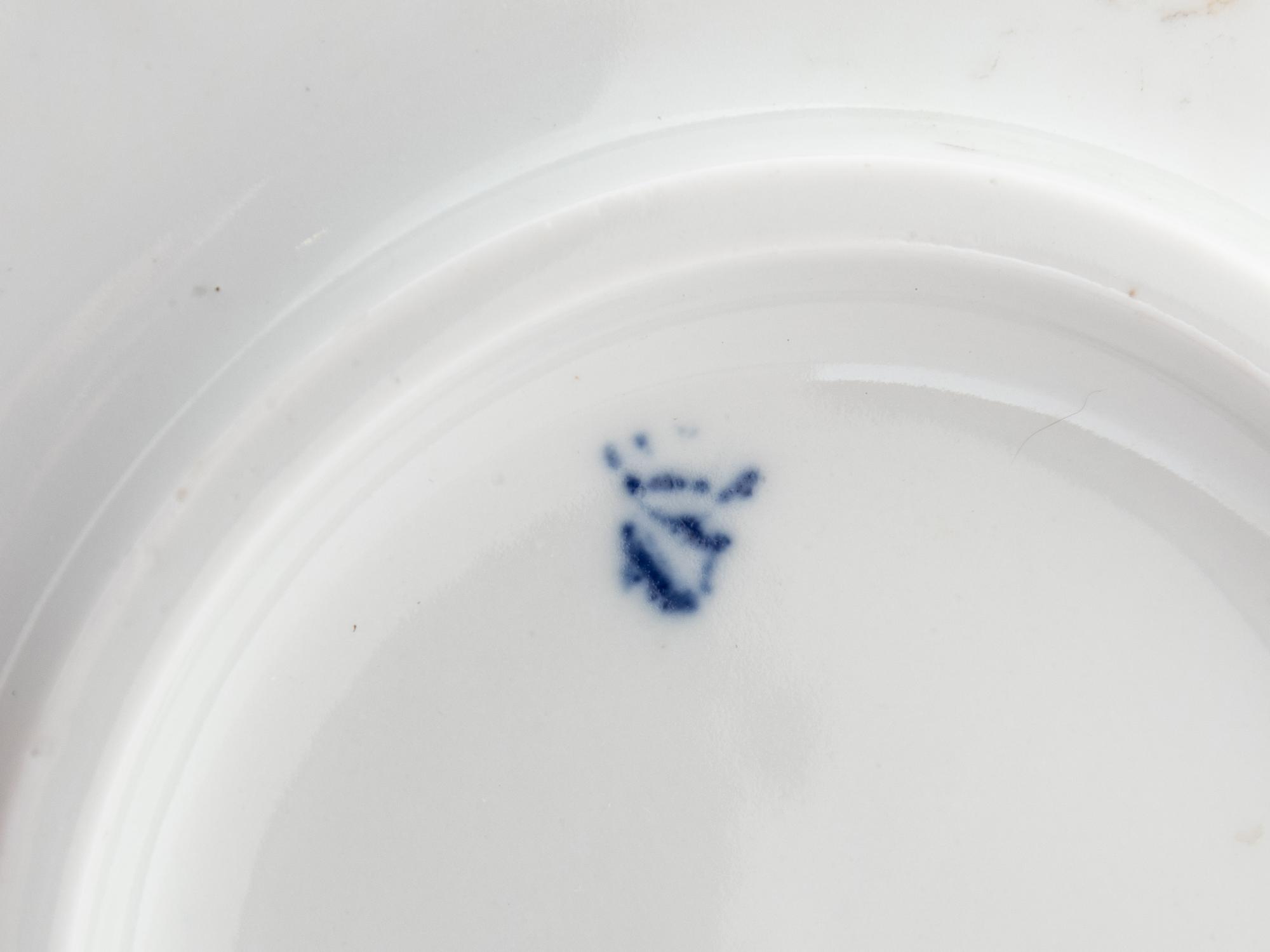 A Pair of Continental Porcelain Figural Groups