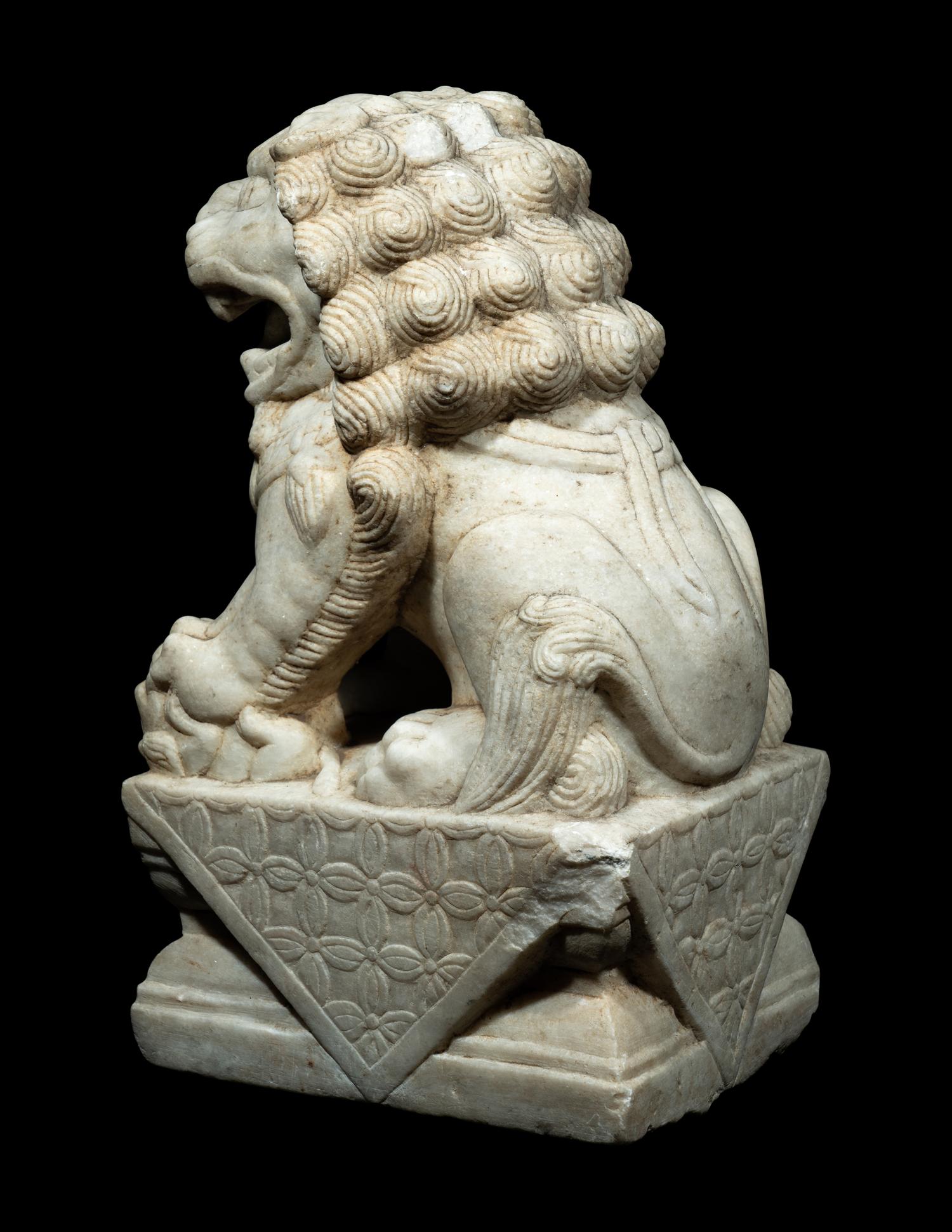 A Chinese Carved White Mable Figure of Fu Lion