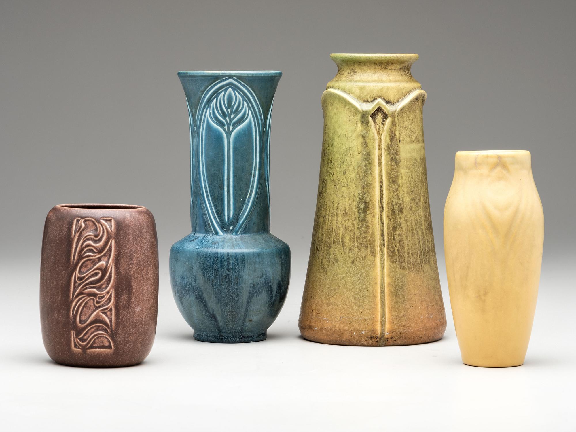 Four Carved Mat Vases