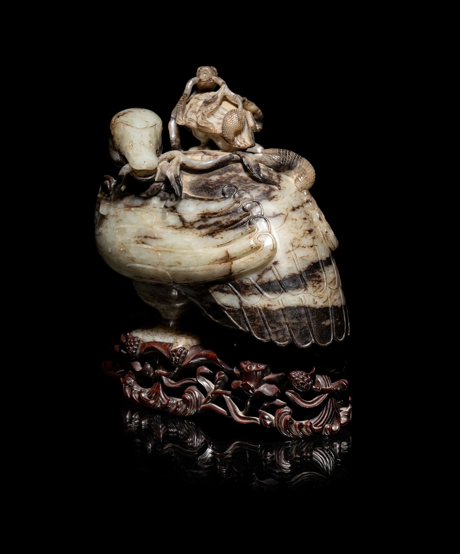 A Chinese Black and White Jade Duck-Form Box and Cover