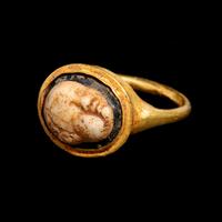 A Roman Gold Finger Ring with Glass Cameo of Eros