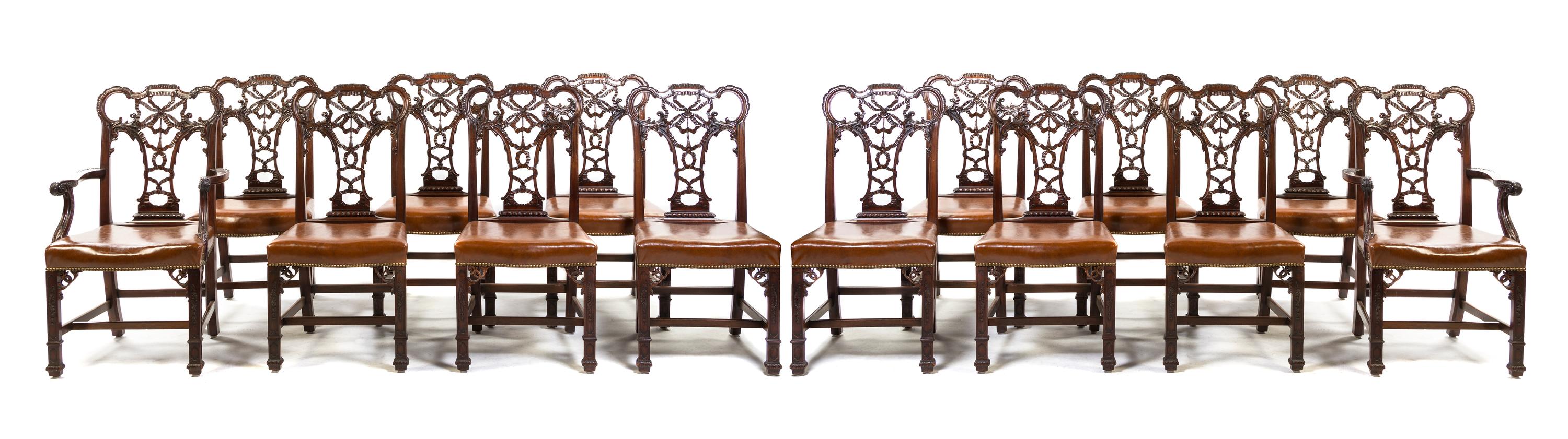 A Set of Fourteen Chippendale Style Mahogany Dining Chairs, Height 40 1/2 inches.