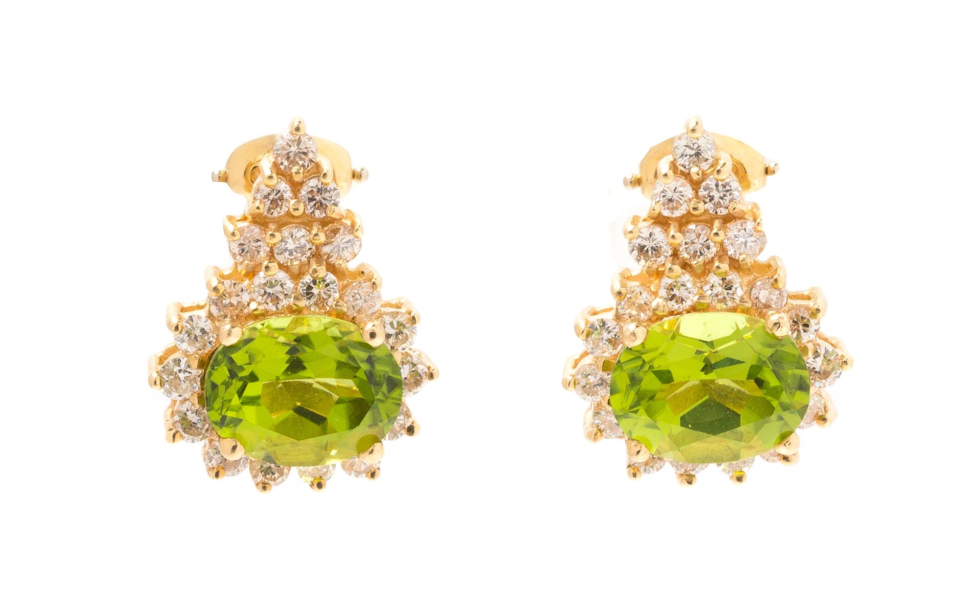 A Pair of 14 Karat Yellow, Peridot and Diamond Earclips, 3.30 dwts.