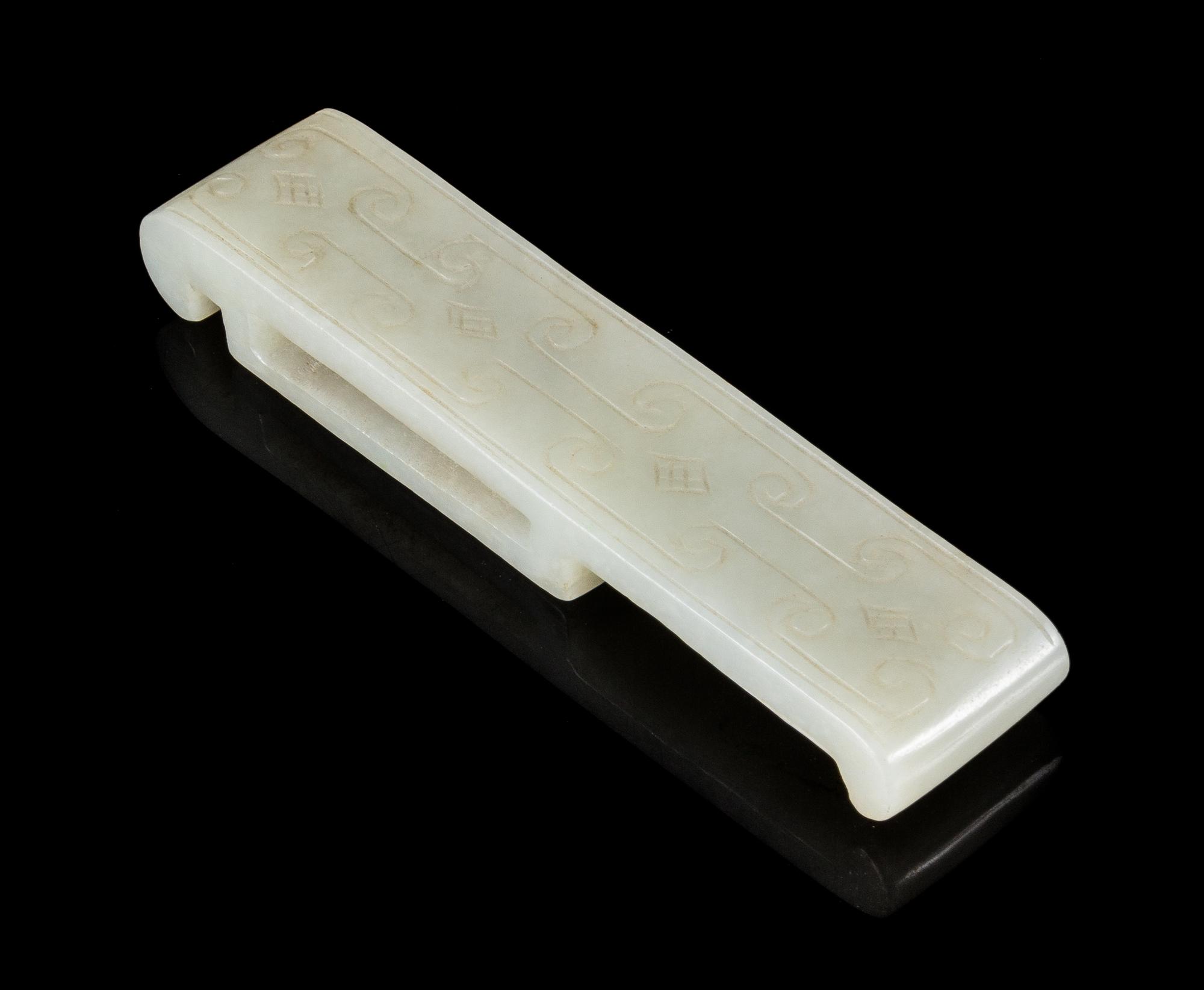 A White Jade Sword Slide Length 4 inches.