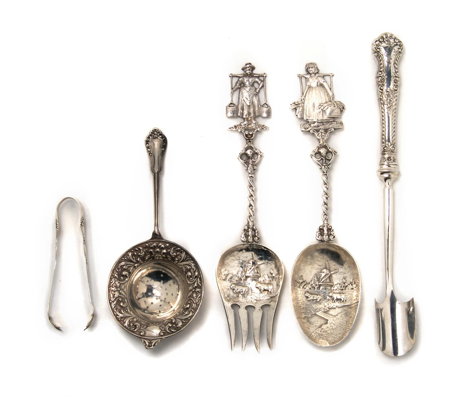 An American Sterling Silver Serving Spoon, retailed by Marshall Field & Co., Height of first 8 1/2 inches.